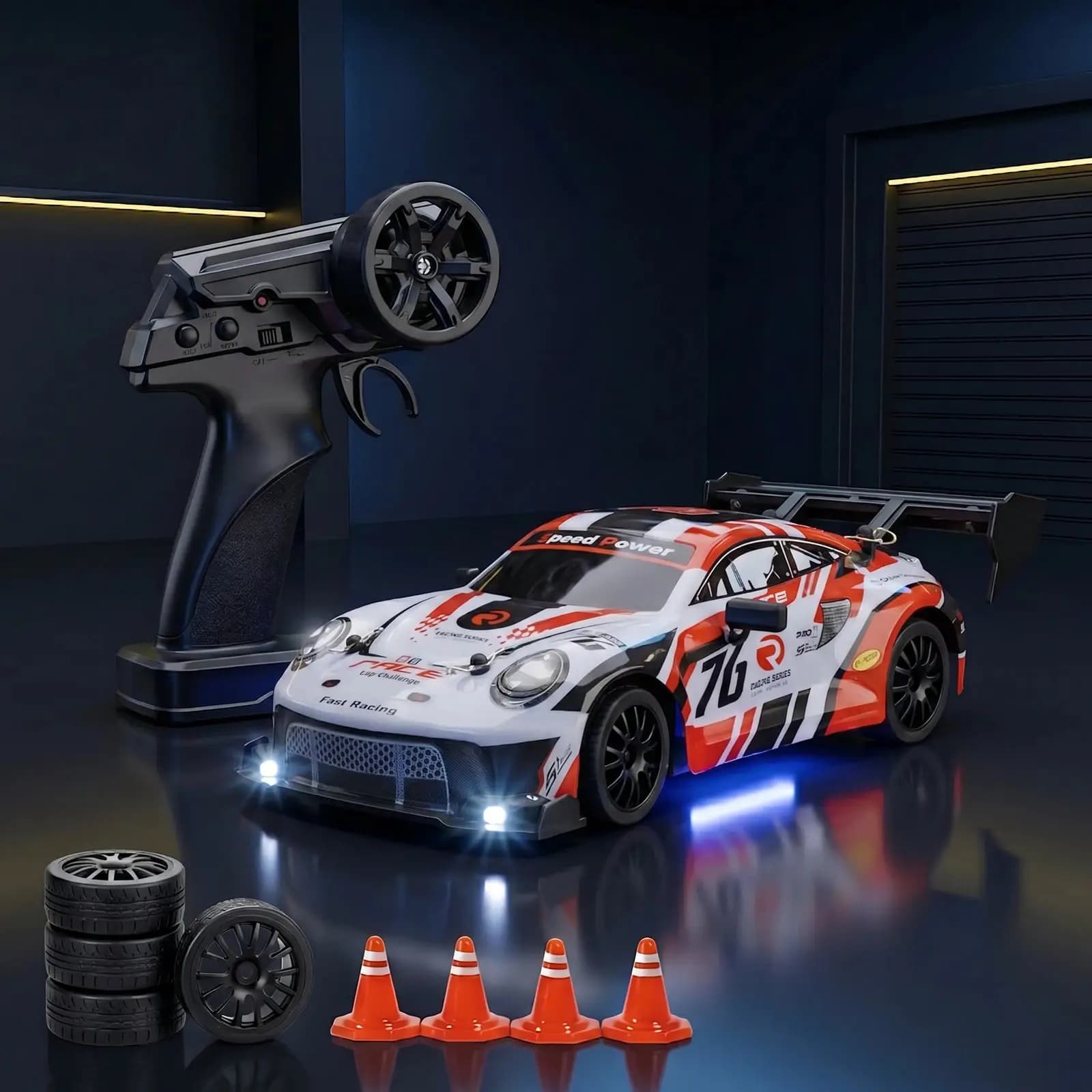 The white and red GT body of the GT Race 24 with the remote, spare wheels and cones